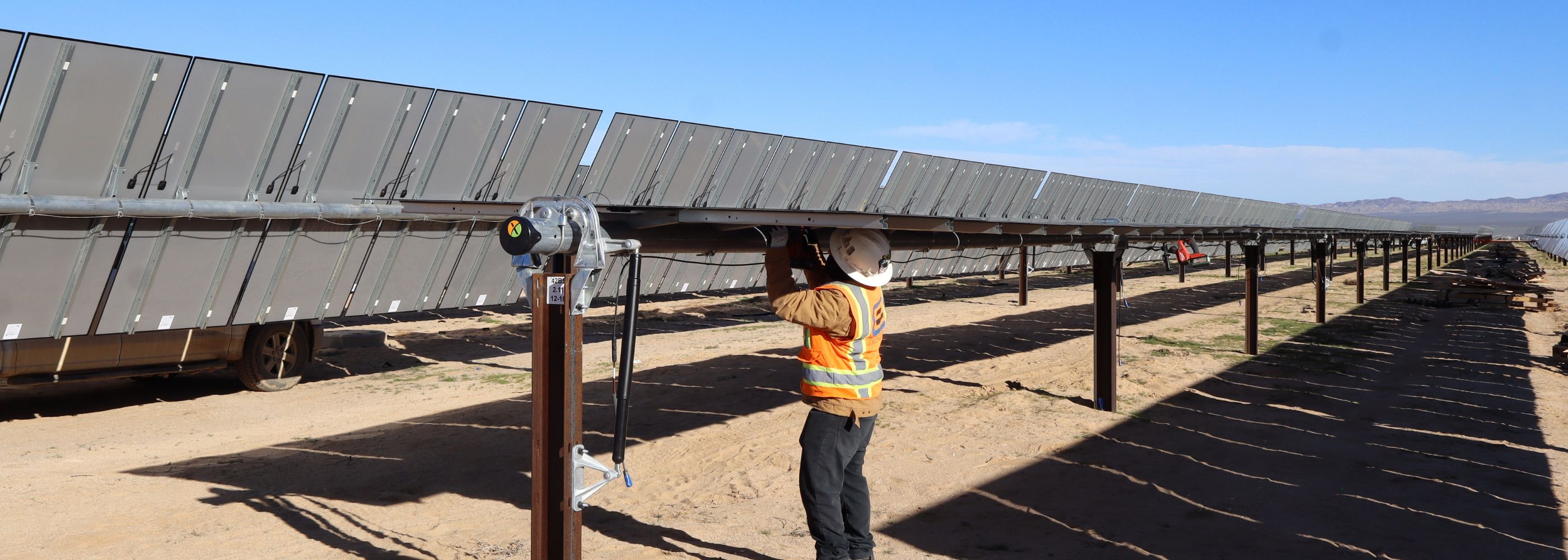 CEI worker installing solar panels on Lockhart Solar project