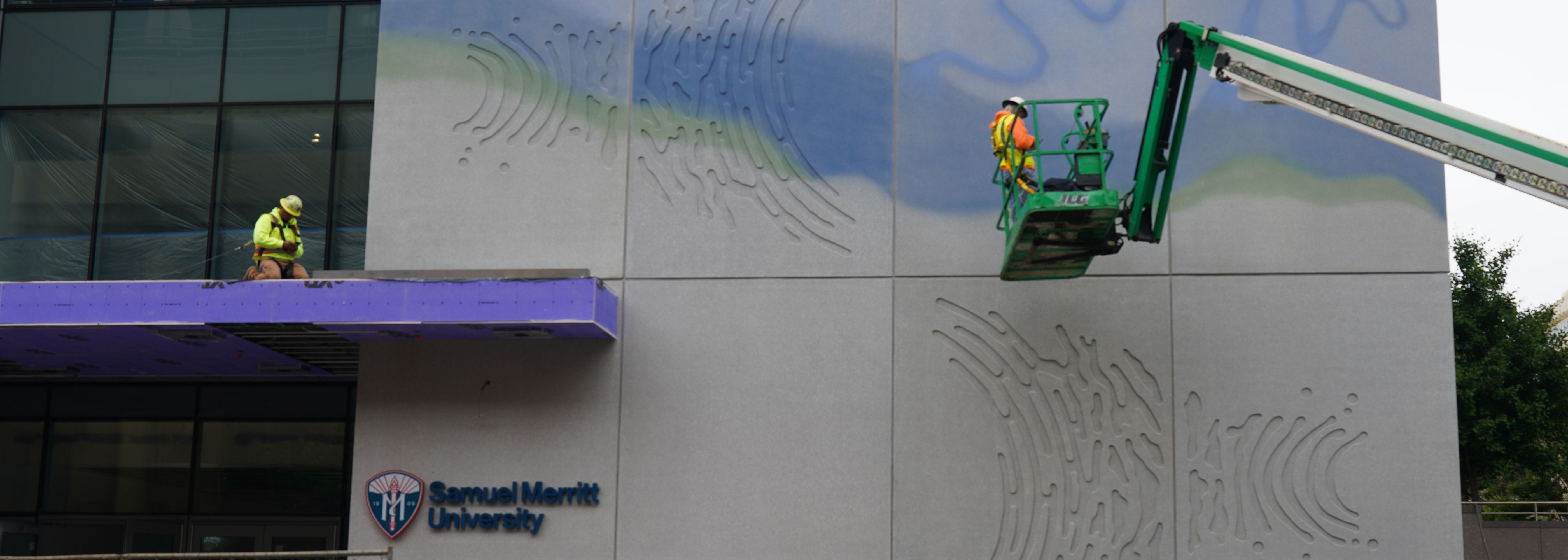 CEI workers on the exterior of Samuel Merritt University