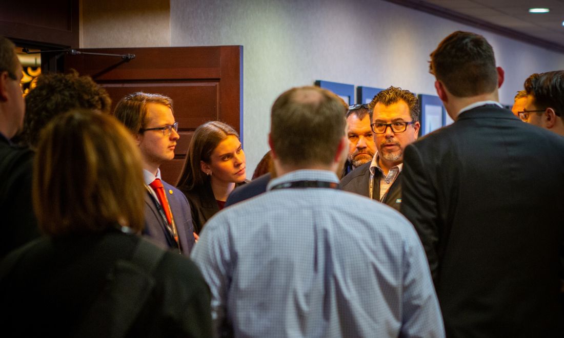People discussing at ASC