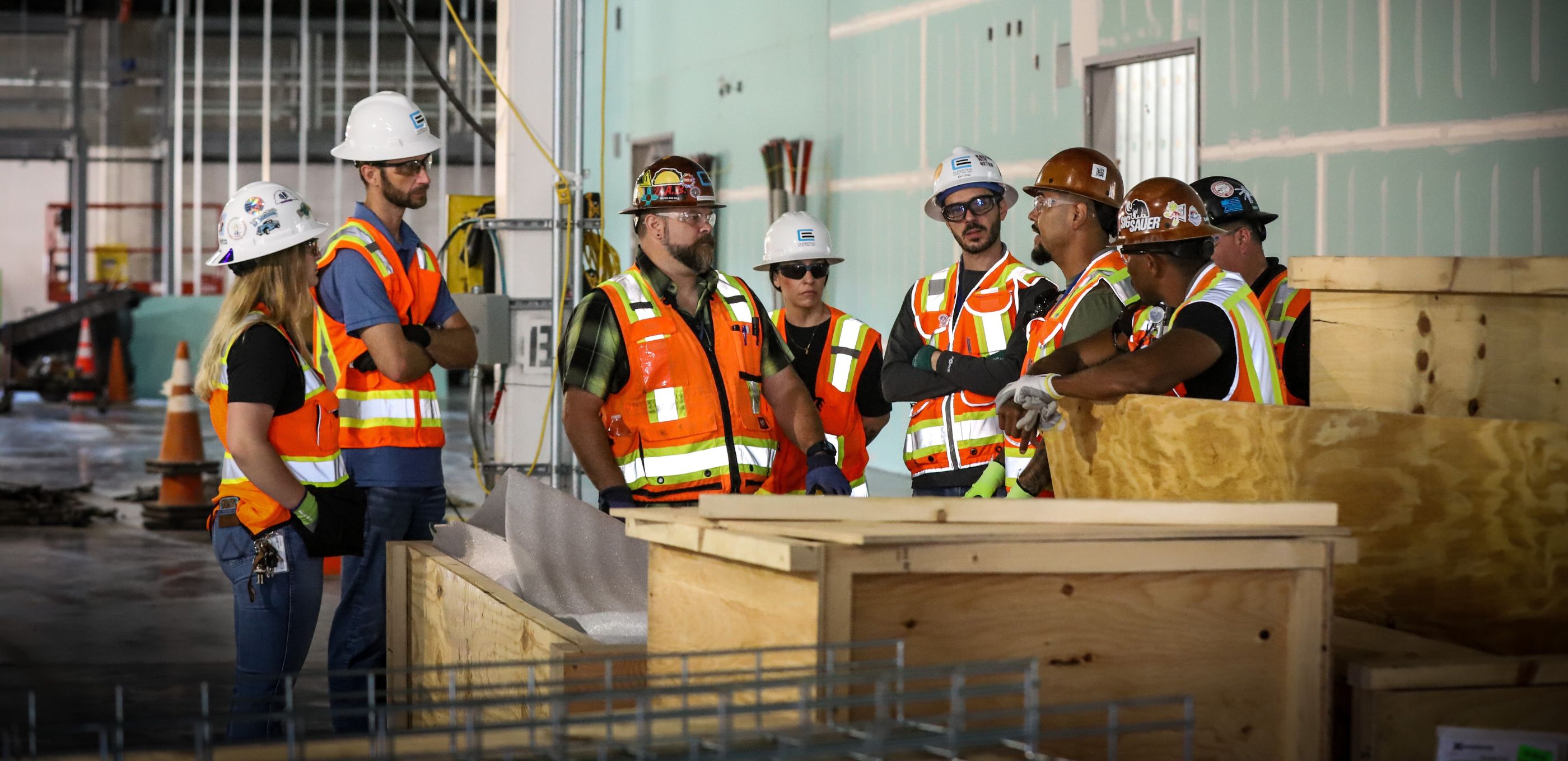 CEI workers discussing